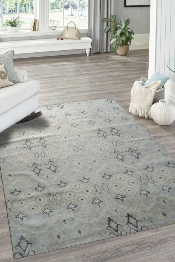 Lush traditional gray hand knotted wool rug 4 Light blue rug with dark gray scattered geometric patterns on light gray wood flooring.