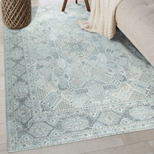 Light blue and gray medallion rug on wood flooring beside a beige sofa and woven basket.