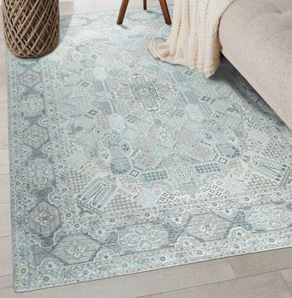 Light blue and gray medallion rug on wood flooring beside a beige sofa and woven basket.