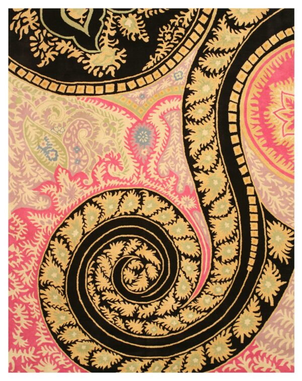 High-contrast rug pattern featuring black, pink, gold, and light green colors in large swirling paisley motifs.