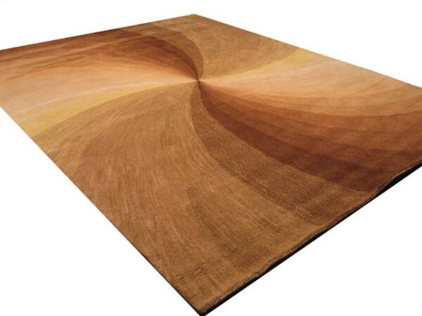 Brown and amber low-pile rug featuring a radial swirling pattern in varying tonal gradients.