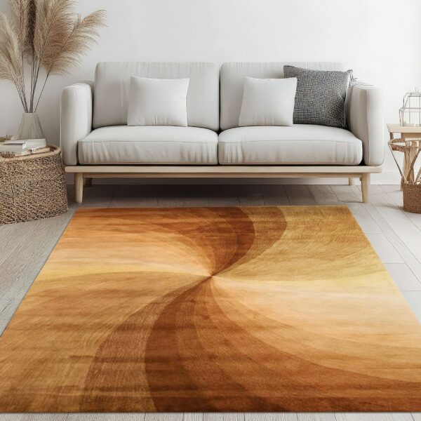 Brown and amber abstract spiral rug placed on a light wood floor in front of a modern white sofa.