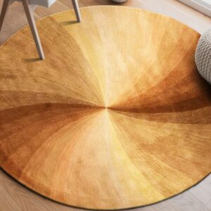 Circular rug with a radial brown and gold swirling pattern rests on a light wood floor.