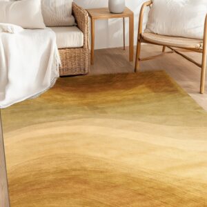 Low pile rug featuring abstract golden-brown color waves in a sunlit room with wicker chairs and wood flooring.