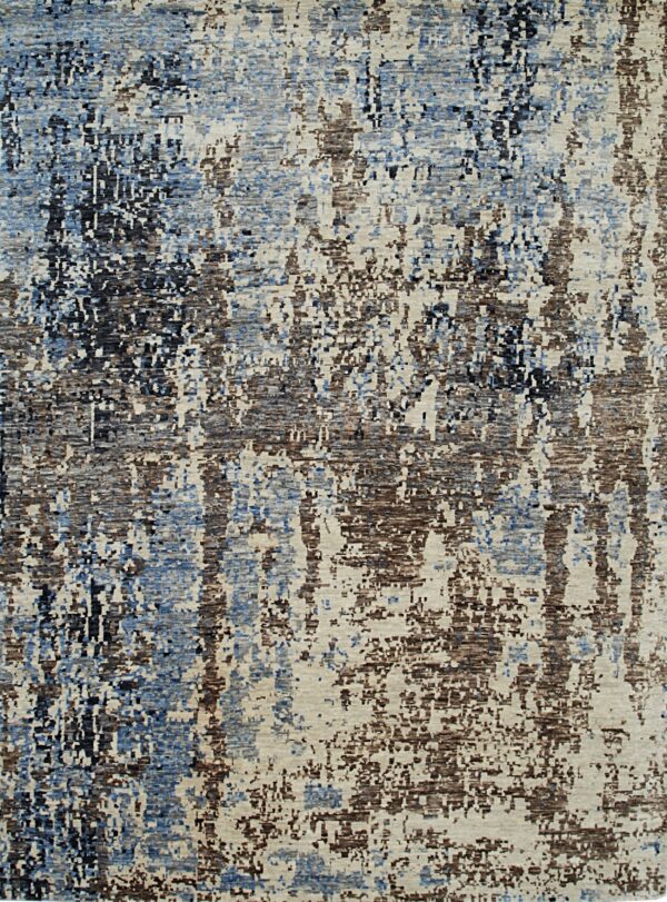 Abstract area rug with an overall distressed pattern in shades of blue, beige, brown, and gray.
