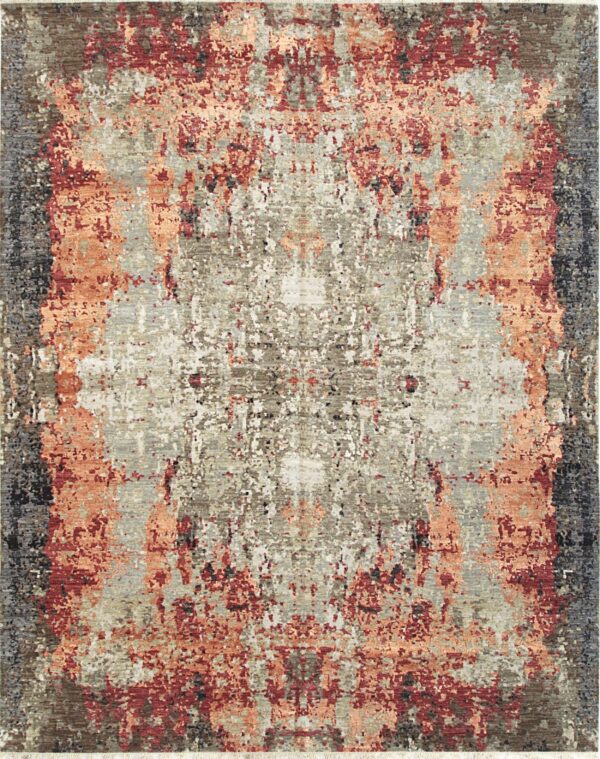 Textured abstract rug in colors of maroon, rust, light grey, and dark brown with visible fringe.