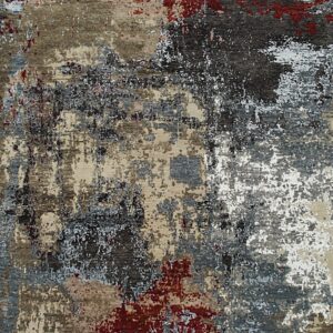 Abstract rug featuring mottled patterns in charcoal, light gray, tan, and splashes of deep red.