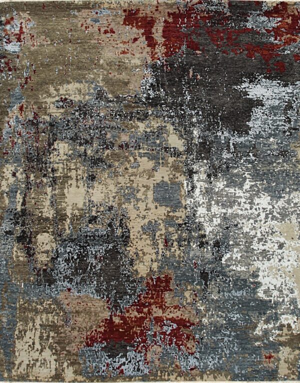 Abstract rug featuring mottled patterns in charcoal, light gray, tan, and splashes of deep red.