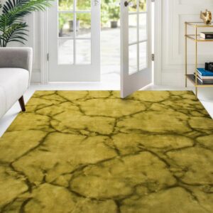 Low-pile yellow rug with dark vein-like pattern in a bright room with white walls and French doors.