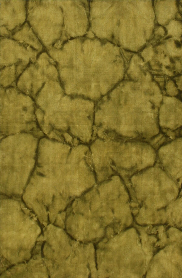 Plush rug texture in olive green featuring an irregular, crackled pattern outlined in dark brown.
