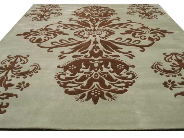 Pale greenish-gray rug with a large, raised brown traditional damask pattern.