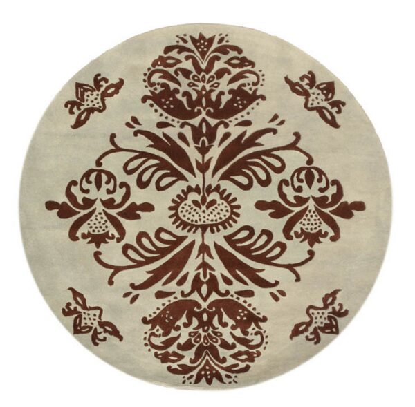 A round low-pile rug with a brown symmetrical floral damask pattern on a cream background.