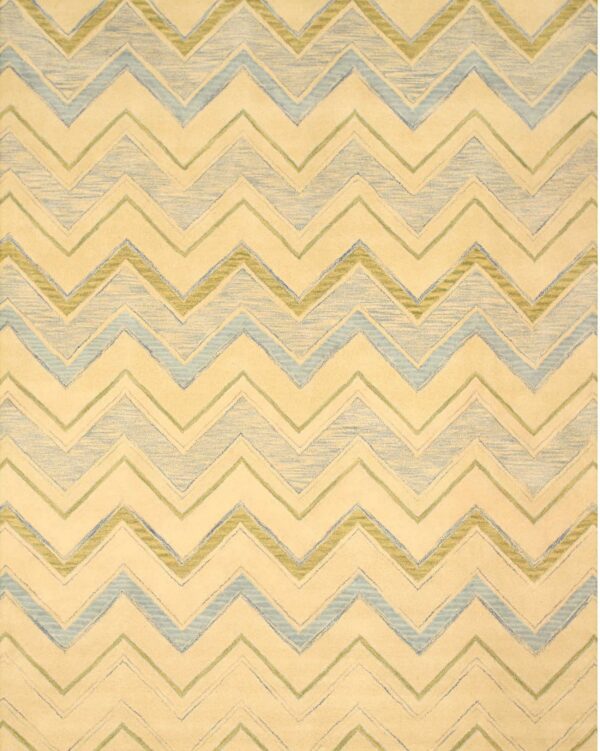 A cream rug featuring a large chevron pattern in textured light blue and olive green.