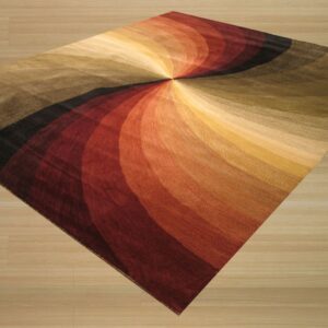 Low-pile rug featuring a radial swirl of red, gold, olive, and black colors sits on light wood flooring.