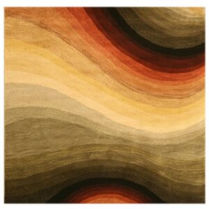 A rug with wavy, carved stripes in shades of gold, rust, olive green, and dark brown.