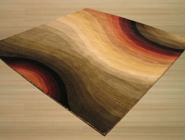A square rug with wavy bands of brown, tan, olive, and deep red sits on light wood flooring.