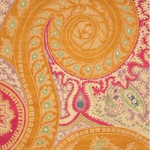 Highly detailed rug pattern featuring a large gold spiral surrounded by magenta, pale green, and cream floral designs.