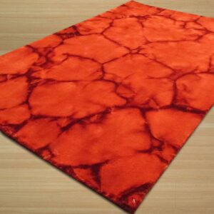 Orange and dark red rug with an abstract cracked pattern on light plank wood flooring.