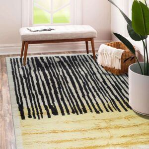 High-pile rug featuring black stripes over white, transitioning to solid shaggy yellow, on wood flooring.