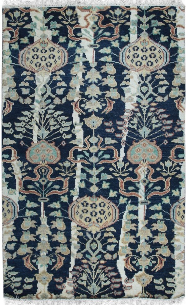 Dark navy rug with a traditional repeating pattern of floral motifs and vertical cream bands.