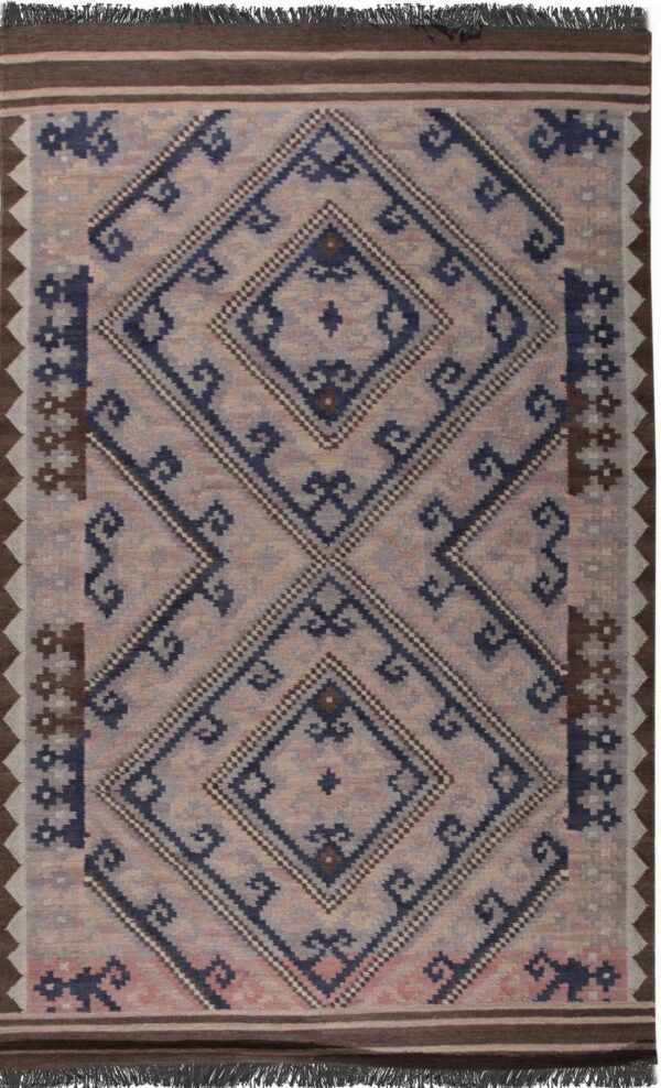 Flatwoven rug in beige, navy blue, and brown with large central geometric diamond designs.