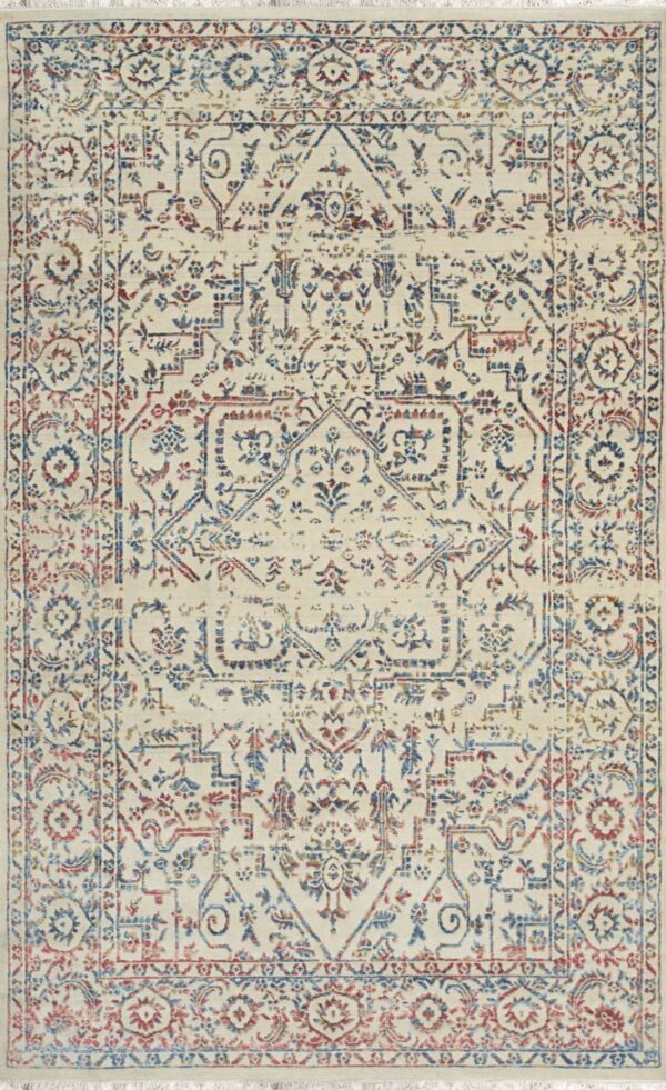 Distressed traditional rug in cream, blue, and red featuring a medallion design and short fringe.