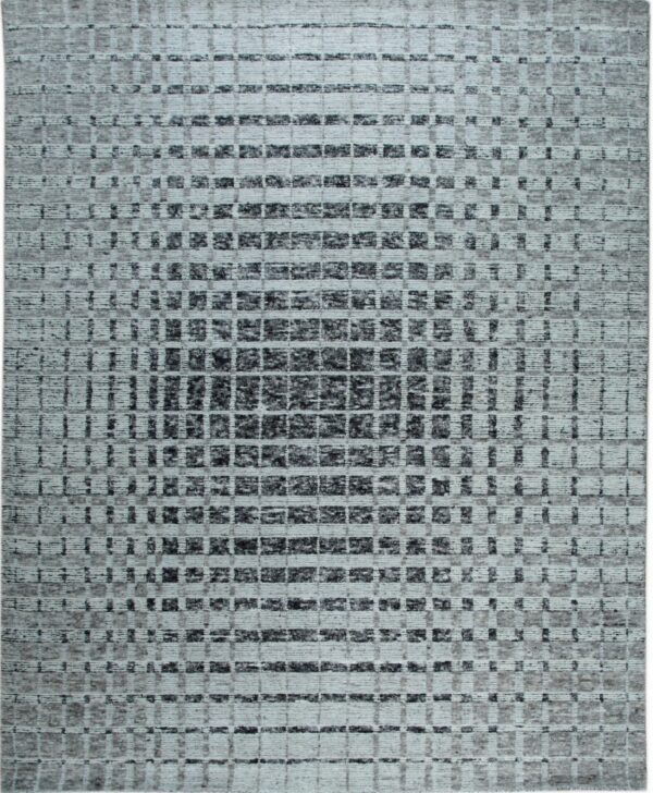 Pale gray, low-pile rug with a textured grid pattern concentrating dark charcoal squares in the center.
