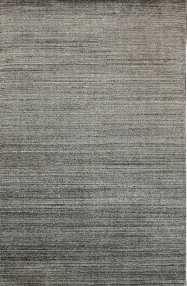 A gray rug featuring horizontal striations in varying shades of charcoal and light gray.