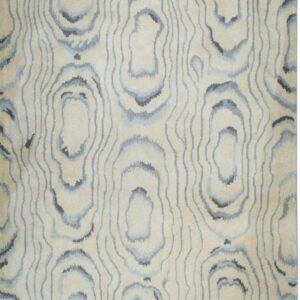 Beige rug featuring an abstract vertical pattern of concentric blue and gray lines.