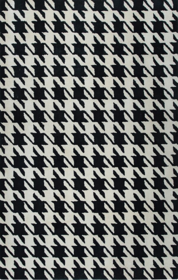 Full view of a low-pile rug with a high-contrast black and off-white houndstooth design.