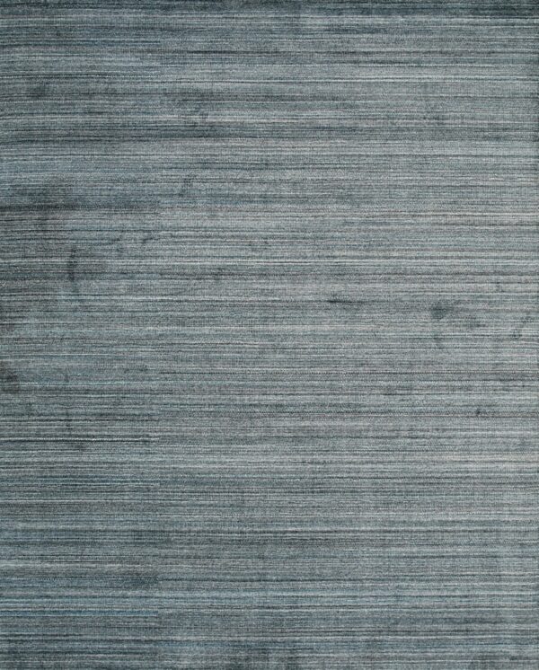 Close-up of a blue and gray heathered rug with strong horizontal striations.