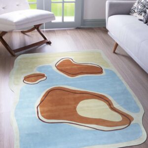 Abstract curved rug featuring blue, brown, and yellow organic shapes in a modern room with wood floors.