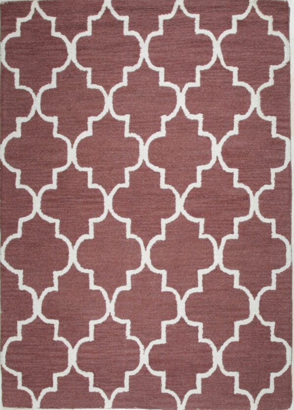 Textured, high-pile rug featuring an off-white quatrefoil geometric pattern on a deep mauve background.