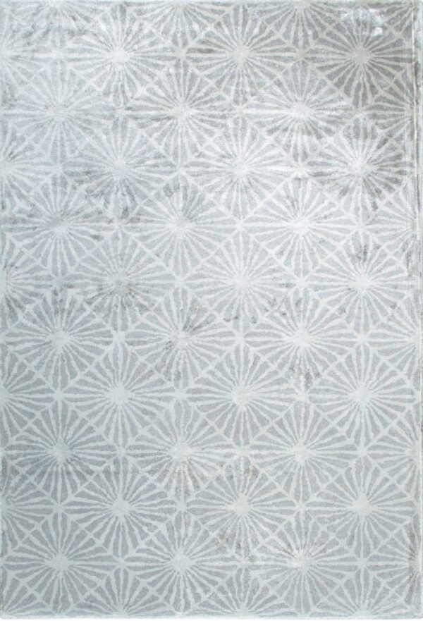Light gray rug featuring a distressed texture and repeating white geometric sunburst motifs.