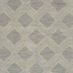 Muted blue-gray rug featuring a repeating geometric diamond pattern with textured cream colored outlines.