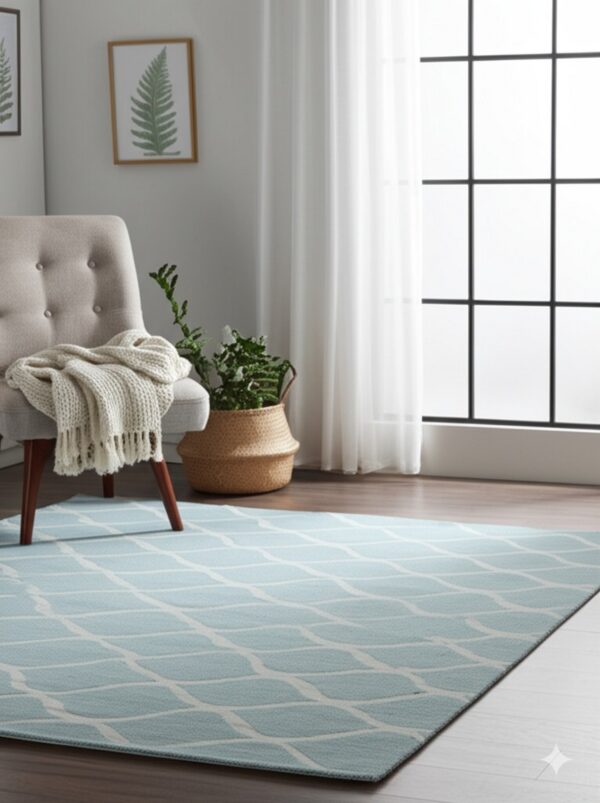 Light blue patterned rug in a bright room with a tufted chair and large grid window.