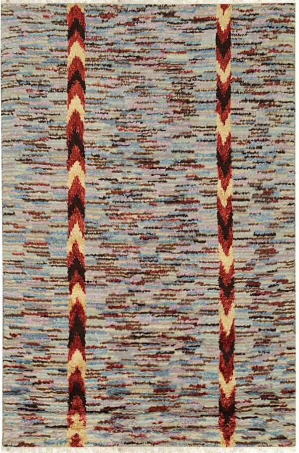 High-pile multi-color rug featuring a striated pattern field and twin vertical zigzag stripes.