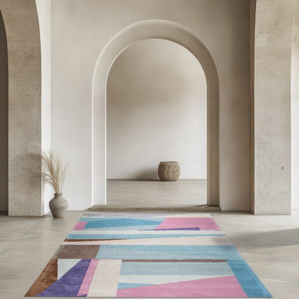 Abstract pink, blue, and purple geometric rug runner on stone flooring leading through two archways.