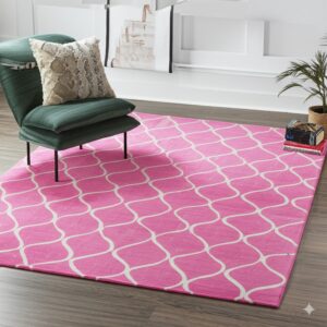 A bright pink rug with a white interlocking pattern is placed beneath a dark green chair on wood flooring.
