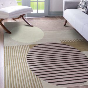 Beige, taupe, and pink geometric rug with large striped circles, grounding a modern seating area.