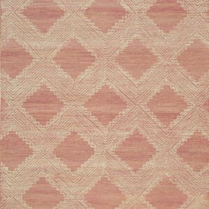 Textured rug in dusty pink and cream with an interlocking geometric diamond pattern.