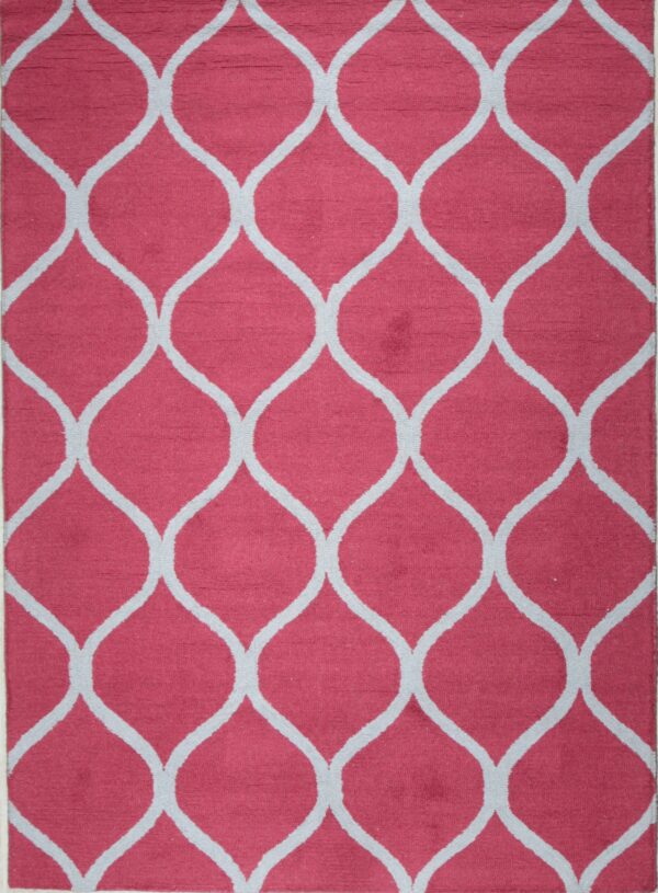 Red rug with white geometric pattern