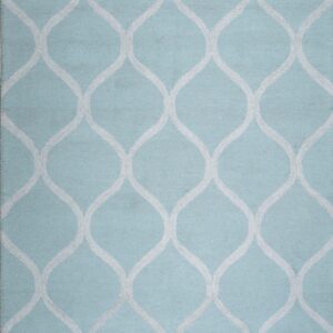 A light blue rug features a white repeating geometric trellis pattern and a visible looped texture.