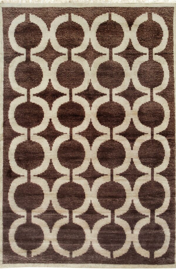 Geometric rug featuring brown linked circles and star shapes against a light cream field.