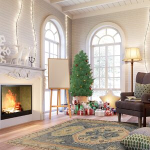 A distressed blue and beige traditional patterned rug sits on wood flooring near a Christmas tree and fireplace.