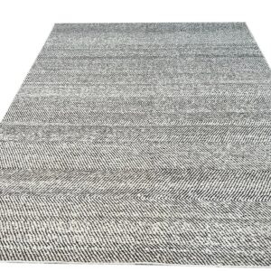 Textured black and white runner rug featuring alternating horizontal stripes with chevron weave.