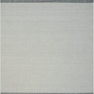 Low-profile rug featuring a light gray field and thick dark charcoal striped borders with white fringes.