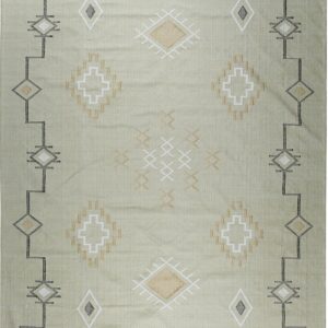 A light sage green flatwoven rug displays geometric diamond patterns in black, white, and tan, finished with tassels.