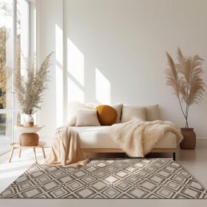 A beige and brown geometric diamond-patterned rug anchors a neutral, sunlit living space.