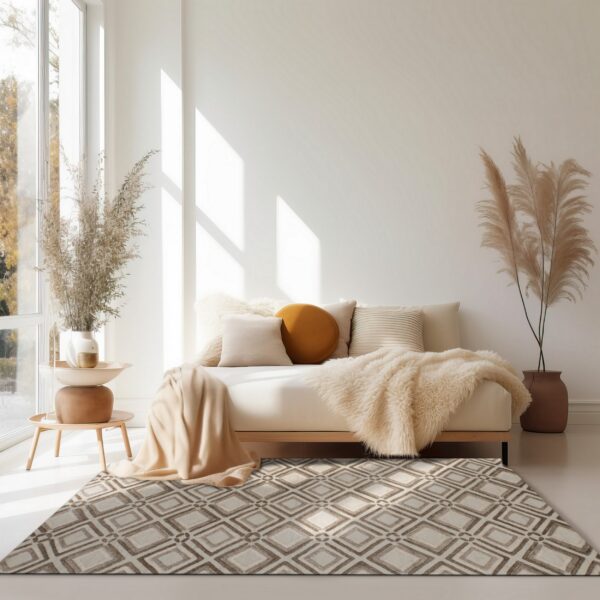 A beige and brown geometric diamond-patterned rug anchors a neutral, sunlit living space.